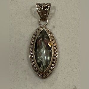 Sterling Silver Pendant With Blue/Grey Stone Filigree Detailing